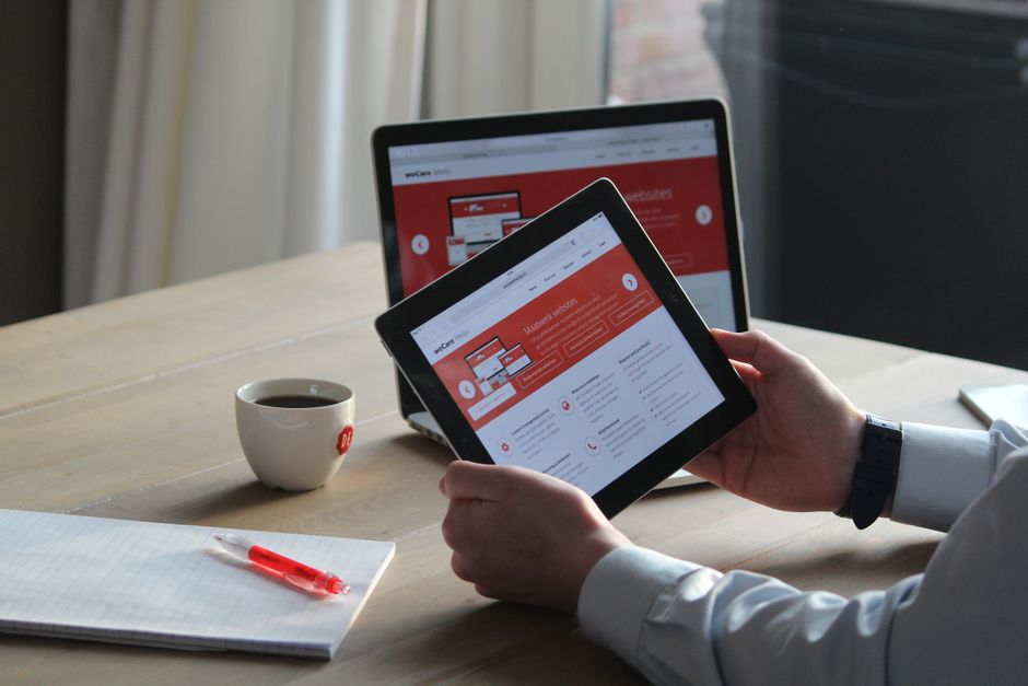small business owner reviewing their professional business website on a laptop